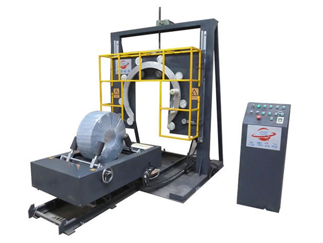 Machine d'emballage pour bobines d'acier